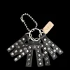 Charms^Consuela Tommy Charm